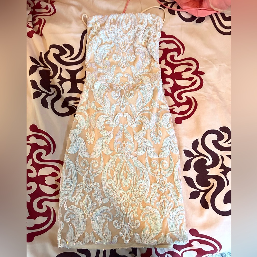 This is a mini sparkly party dress.
